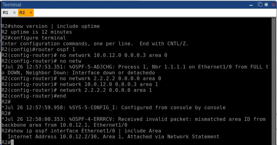 Real Cisco IOS console output showing the OSPF-5-ADJCHG down transition and the OSPF-4-ERRRCV mismatched area ID error message